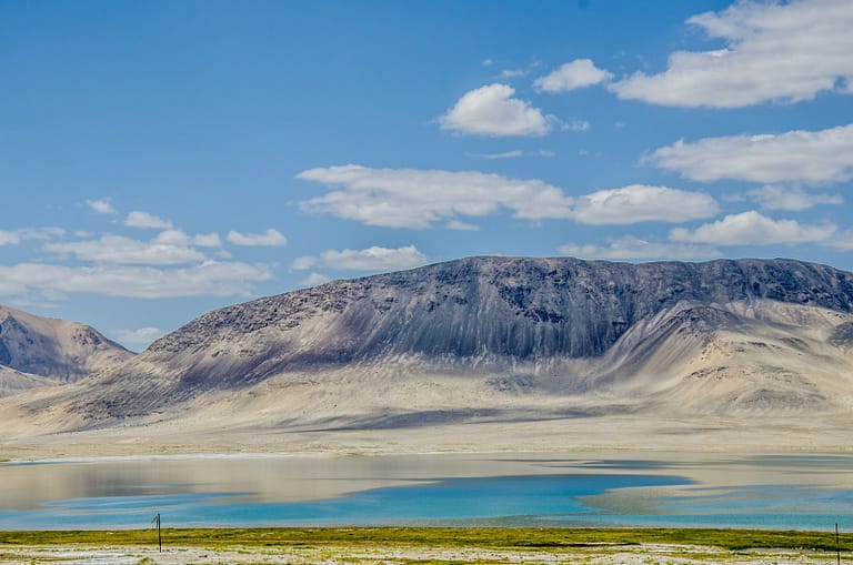 brown and white mountain under blue sky during daytime